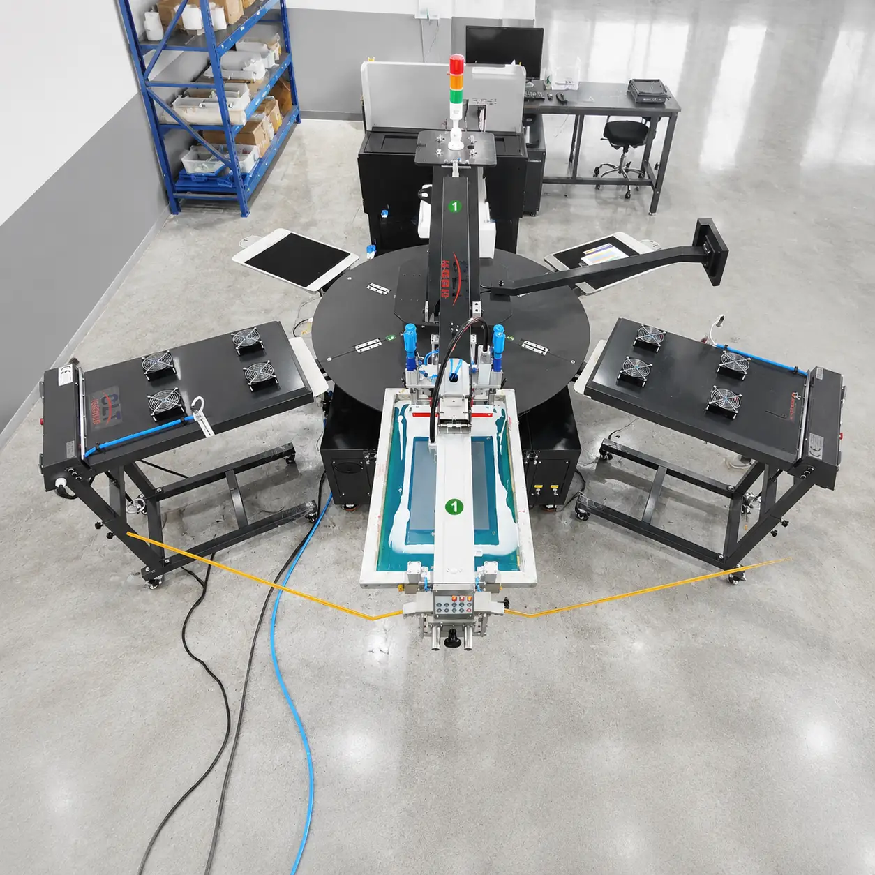 CLT-DTG-2IN1-45-70 compact hybrid printer operating on rotary carousel