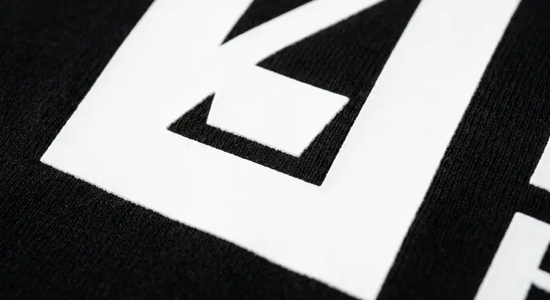 High opacity white elastic printing paste on black t-shirt